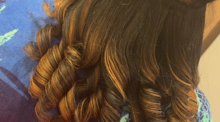 Beautifully styled curls at IvyBeautyBar2 in Darien, Illinois, US. Enhance your look with expert hair services.