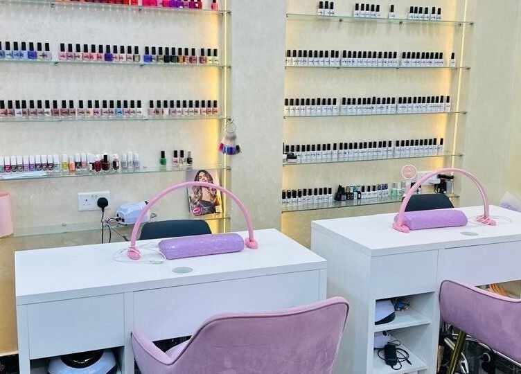 Nail salon interior at Samiha Alsarraj Ladies Salon in Sharjah, Sharjah, AE with colorful polish display.