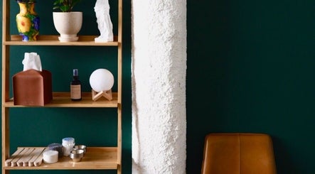 Beautifully arranged shelf at A1A Massage, New York, New York, US, featuring elegant decor with calming ambiance.