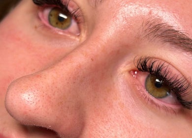 Close-up of expertly applied eyelash extensions at Anna Louise Beauty in Devizes, England, GB.