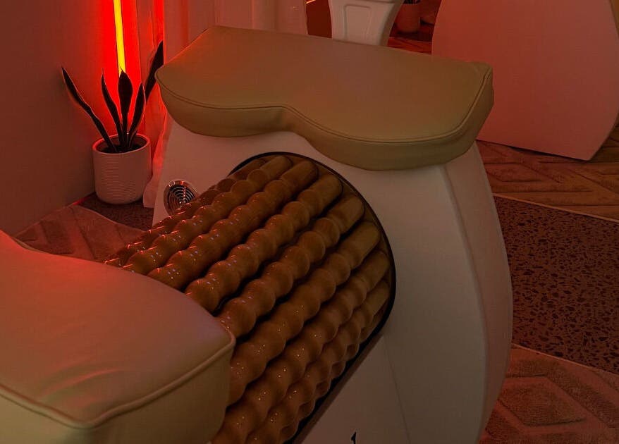 Massage roller at The Body Roll Studio in Auckland, Auckland, NZ with ambient red lighting.