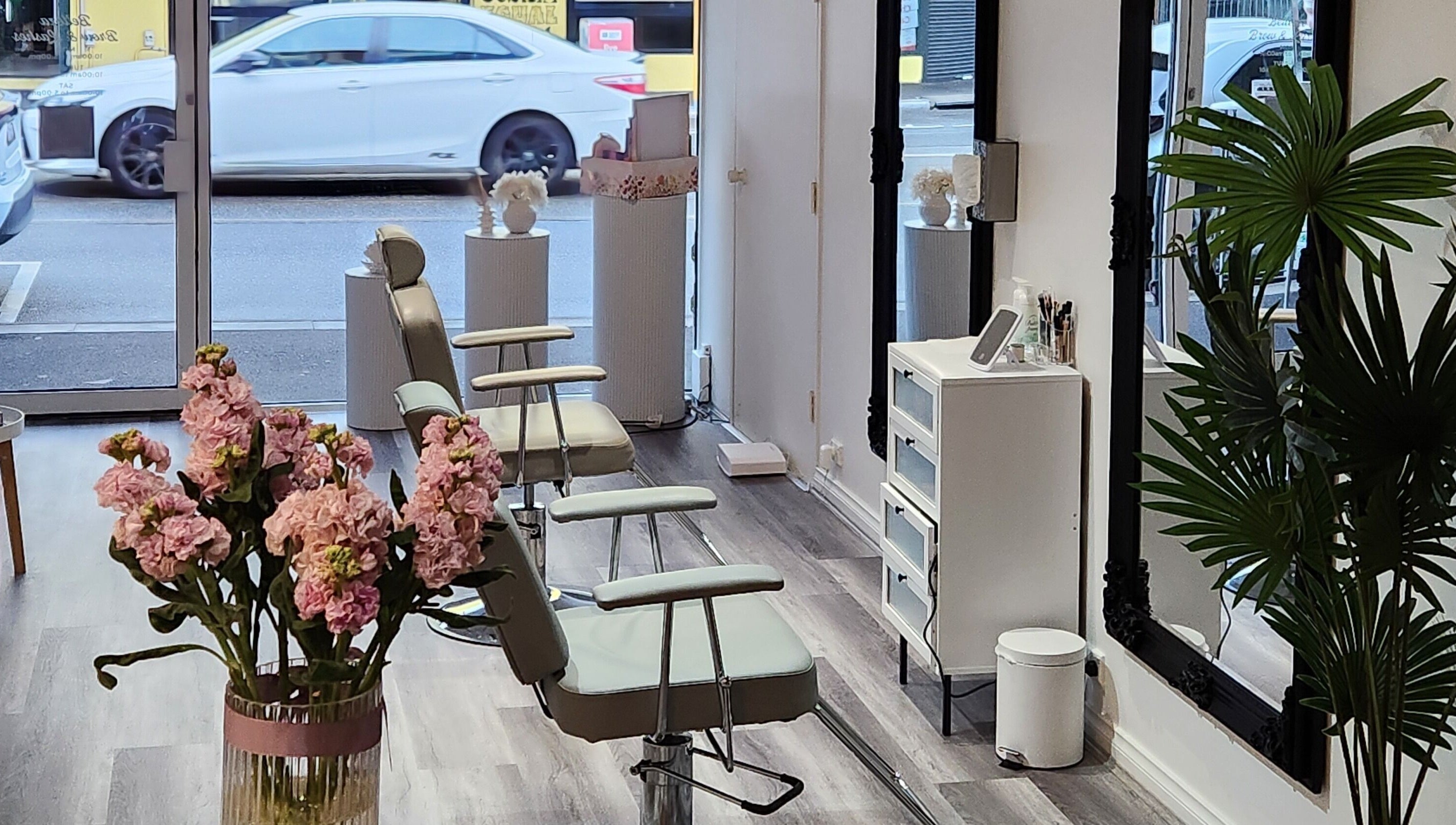 Stylish interior of Belleza Brows & Lashes in Melbourne, Victoria, AU with elegant seating and decor.