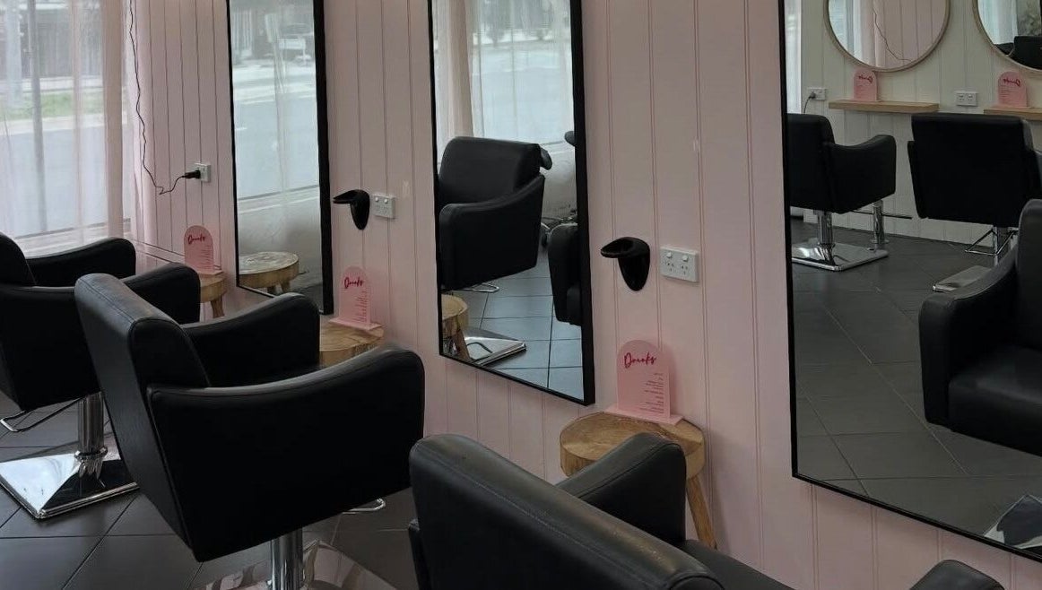 Modern styling chairs and mirrors at Grace Mae Hair Artistry in Melbourne, Victoria, AU.