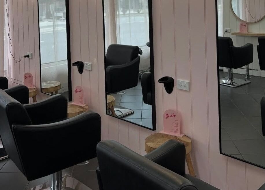 Modern styling chairs and mirrors at Grace Mae Hair Artistry in Melbourne, Victoria, AU.