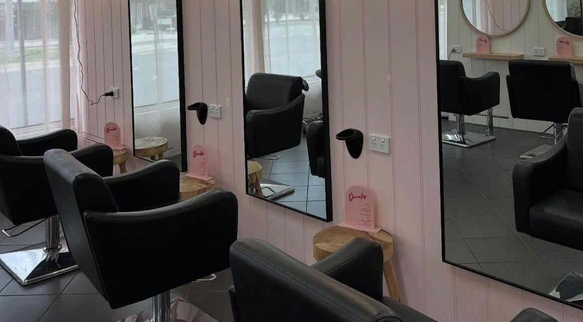 Modern styling chairs and mirrors at Grace Mae Hair Artistry in Melbourne, Victoria, AU.