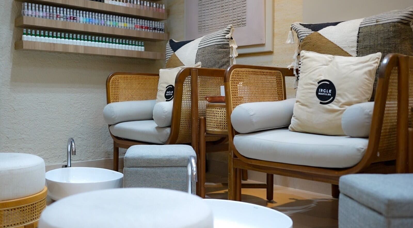 Comfortable seating and foot basins at Circle Beauty and Spa in Abu Dhabi, Abu Dhabi, AE.
