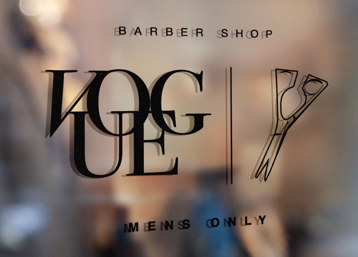 Ingresso di Vogue Barber Shop a Arceto, Emilia-romagna, IT con insegna elegante.