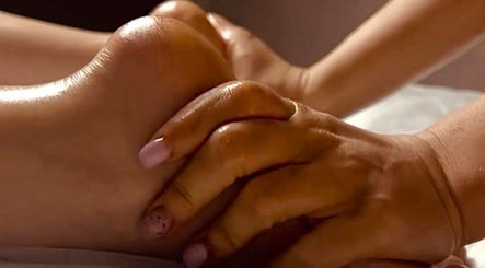 Foot massage at Lumina Beauty Salon, Whittlesey, England, GB, showcasing relaxation expertise.