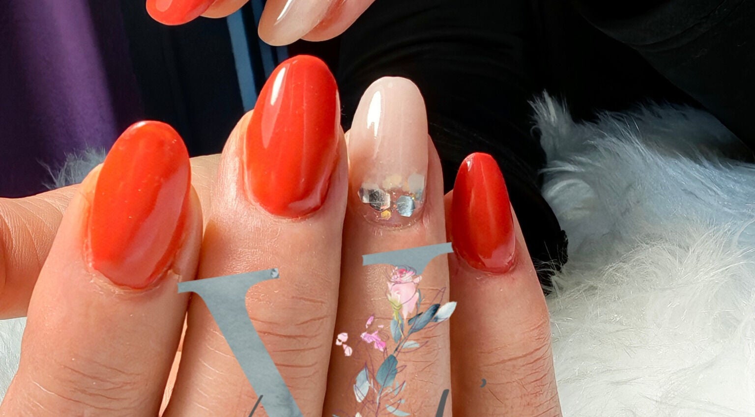 Vibrant red manicure at Vanette's Nail Studio in Boksburg, Gauteng, ZA showcasing artistic design.