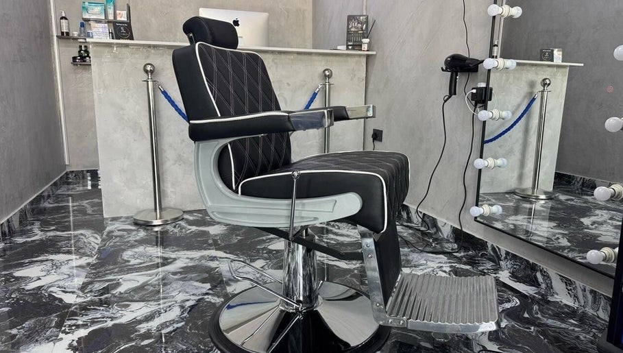 Modern barber chair at A Club Barbers, Dubai, Dubai, AE, reflecting luxury and style in a chic setting.