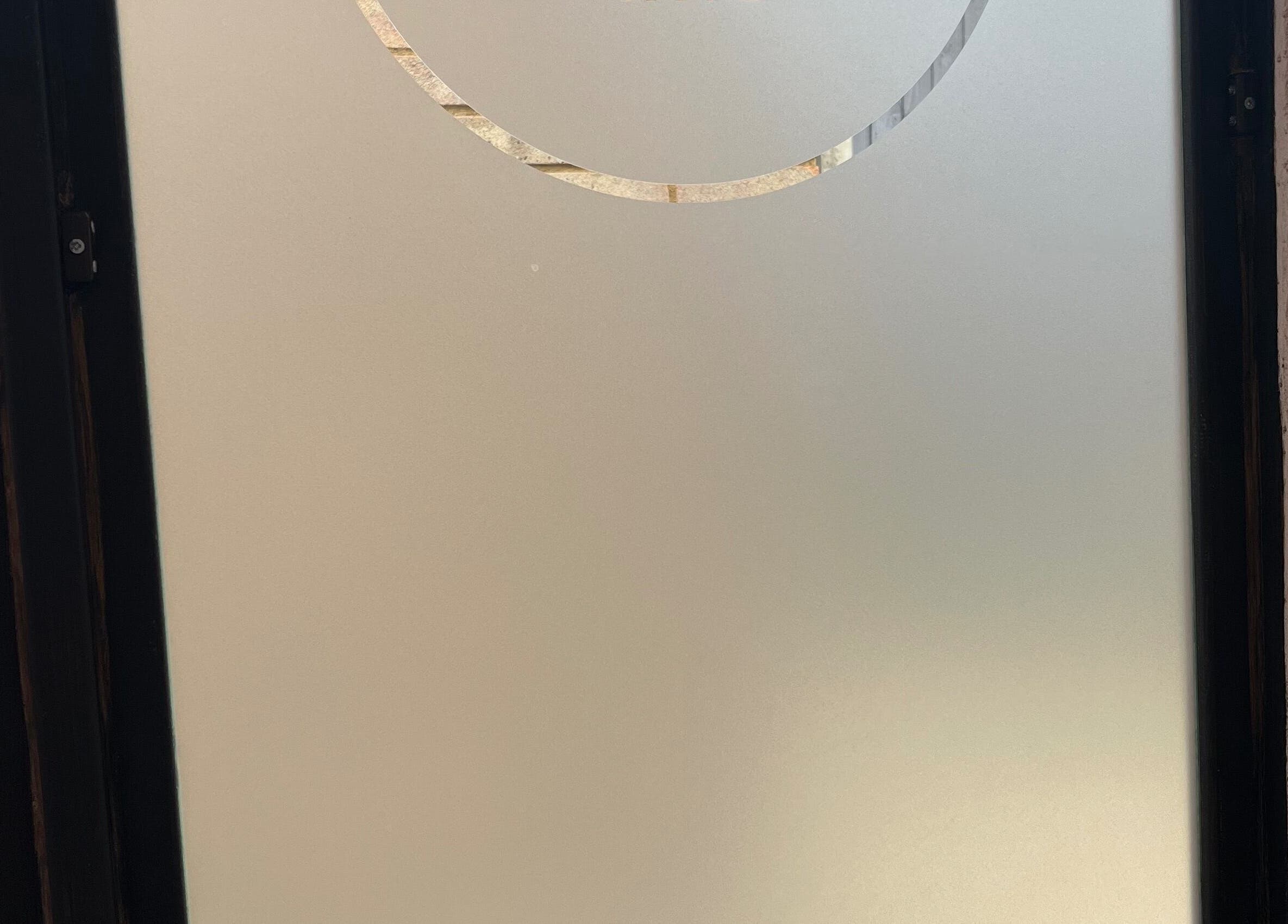 Elegant frosted glass panel at Glam Bar Ampthill, Ampthill, England, GB, enhancing privacy and style.