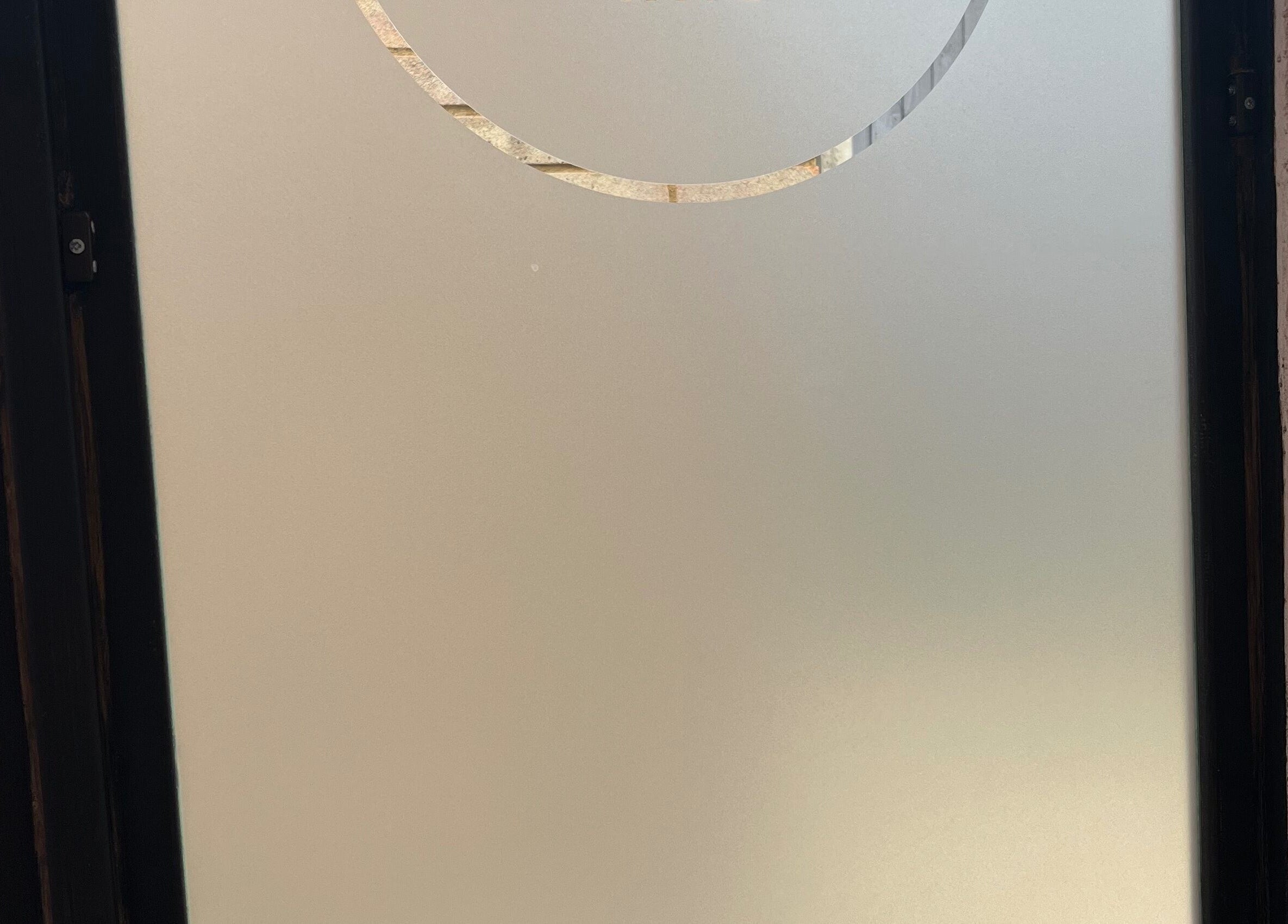 Elegant frosted glass panel at Glam Bar Ampthill, Ampthill, England, GB, enhancing privacy and style.