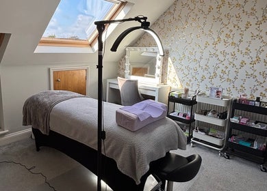 Tranquil treatment room at LA Lashes&Brows, West Wickham, England, GB, under skylight with elegant decor.