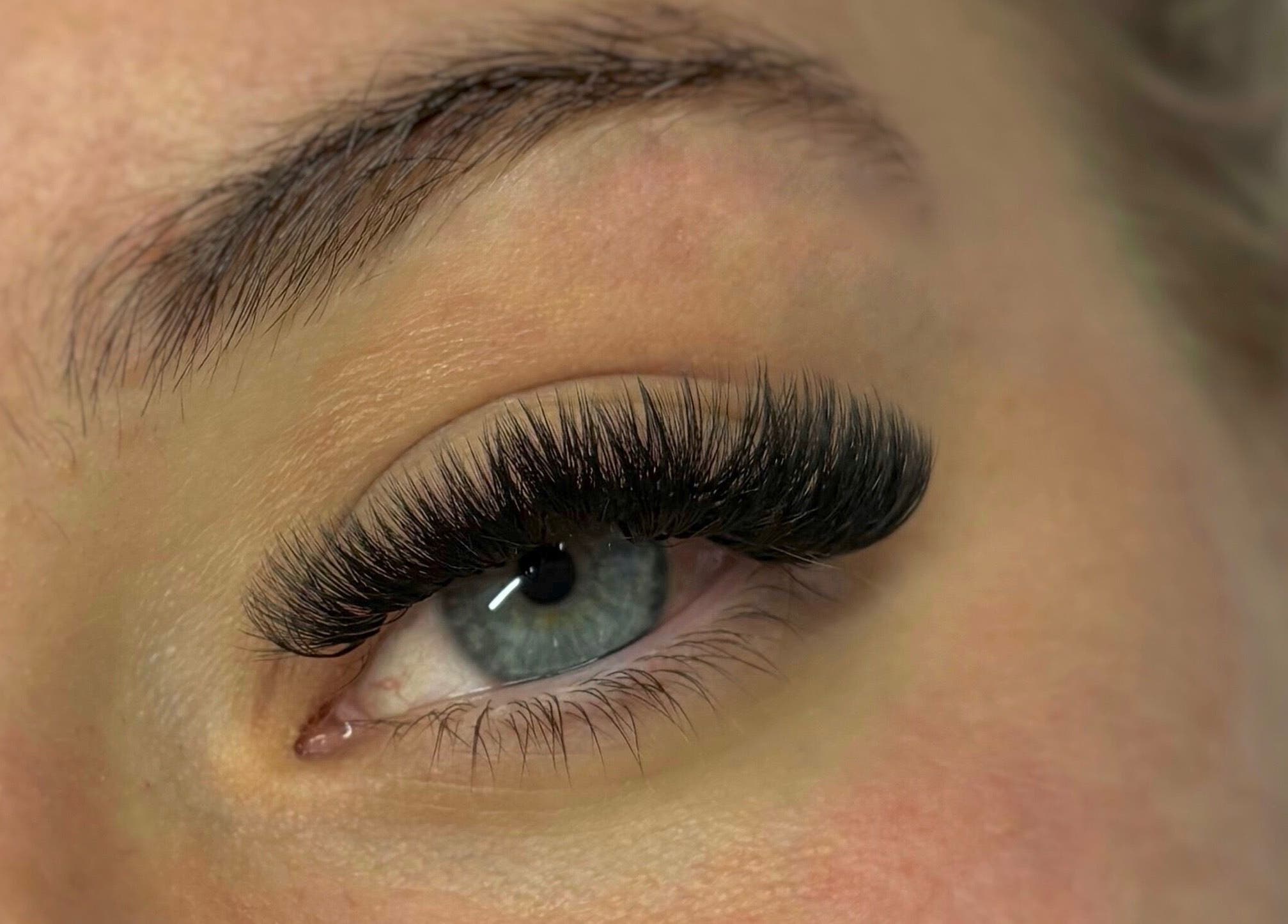 Expert eyelash extensions at LA Lashes & Brows, West Wickham, England, GB, showcasing voluminous lashes.