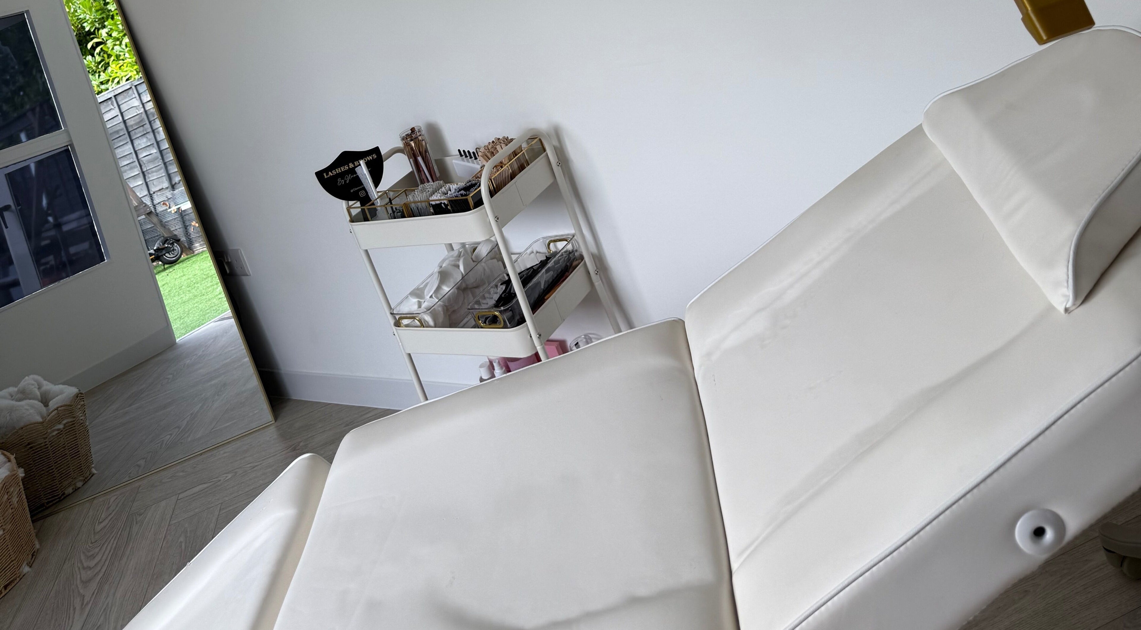 Relaxing treatment room at Glam Up by Lex in Coventry, England, GB with a comfortable massage bed.