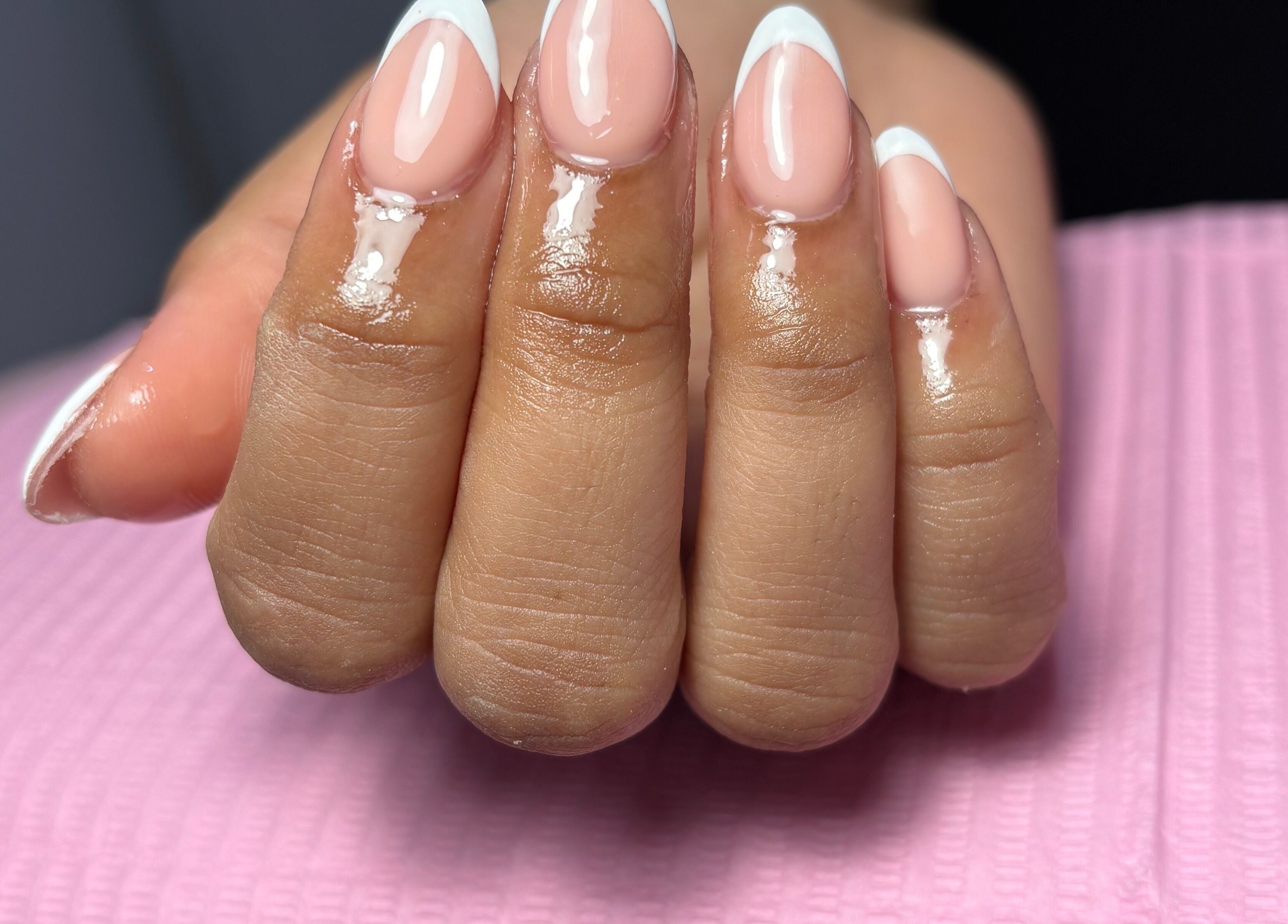 Elegant French manicure at ThatbeautyFlo, Billingham, England, GB. Highlighting sleek, well-groomed nails.