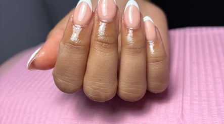 Elegant French manicure at ThatbeautyFlo, Billingham, England, GB. Highlighting sleek, well-groomed nails.