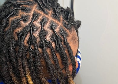 Close-up of detailed braiding at PA Beauty, Leicester, England, GB showcasing textured hairstyles.