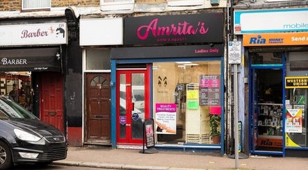 Front view of Amrita's Hair and Beauty salon in London, England, GB, showcasing its vibrant exterior.
