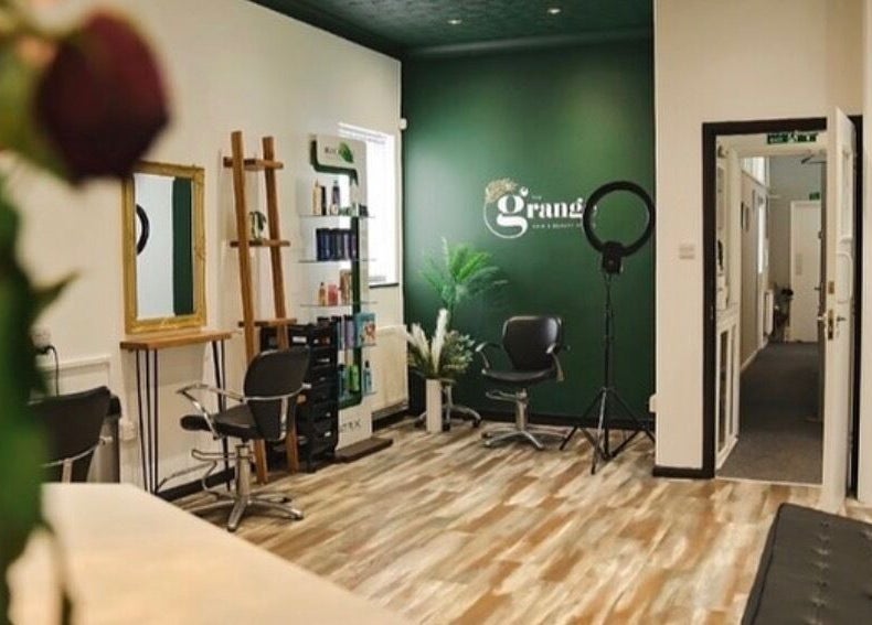 Modern styling chairs and elegant decor at Megan Hair, Norwich, England, GB for a sleek salon experience.