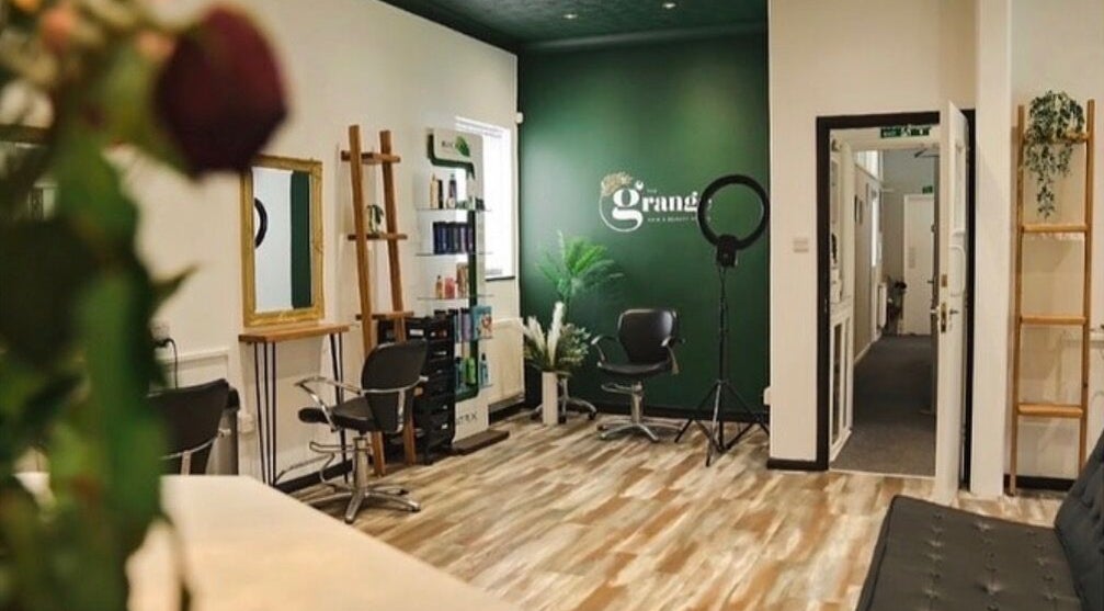Modern styling chairs and elegant decor at Megan Hair, Norwich, England, GB for a sleek salon experience.