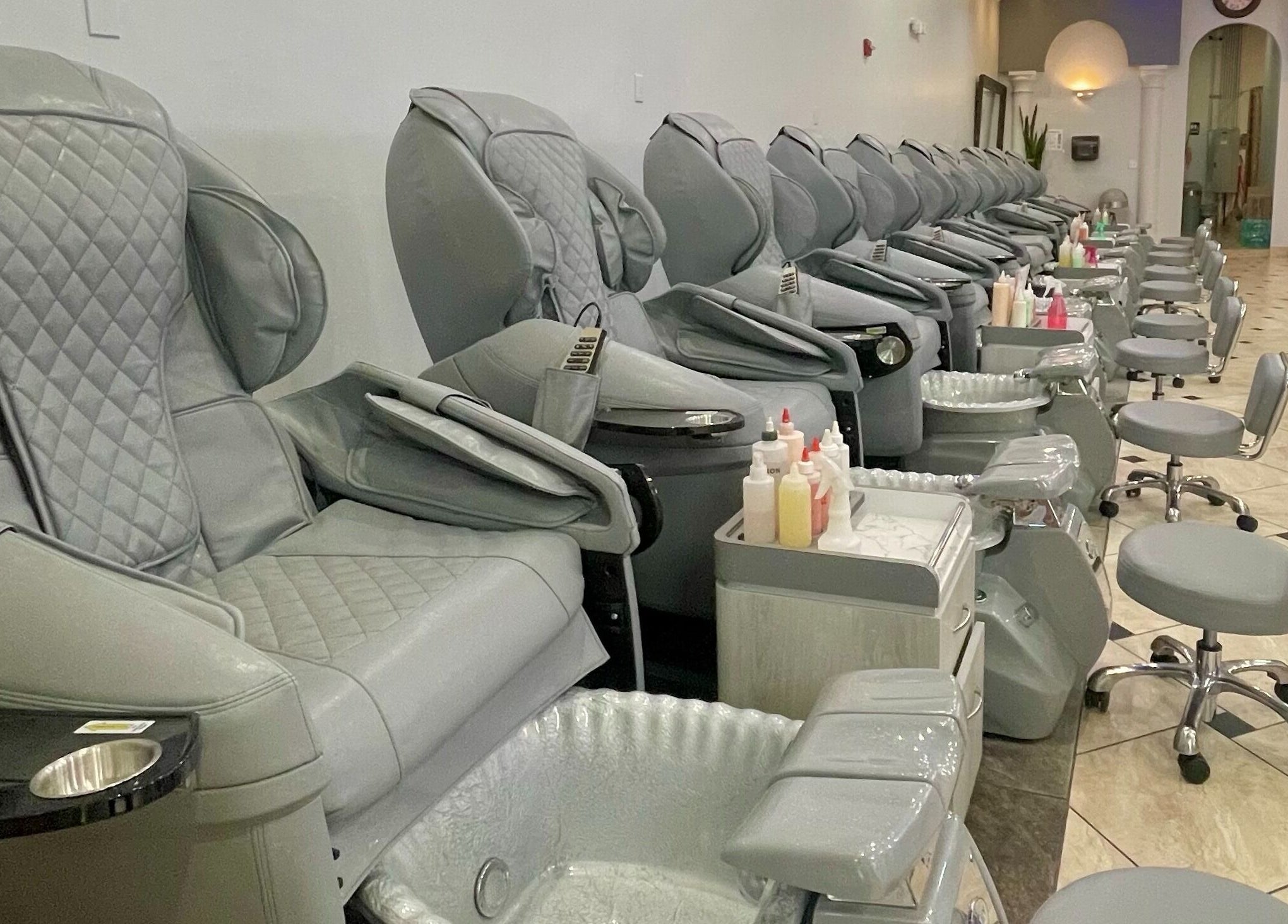 Elegant pedicure chairs at Aladdin Nails & Spa in Ocoee, Florida, US offering a luxurious experience.