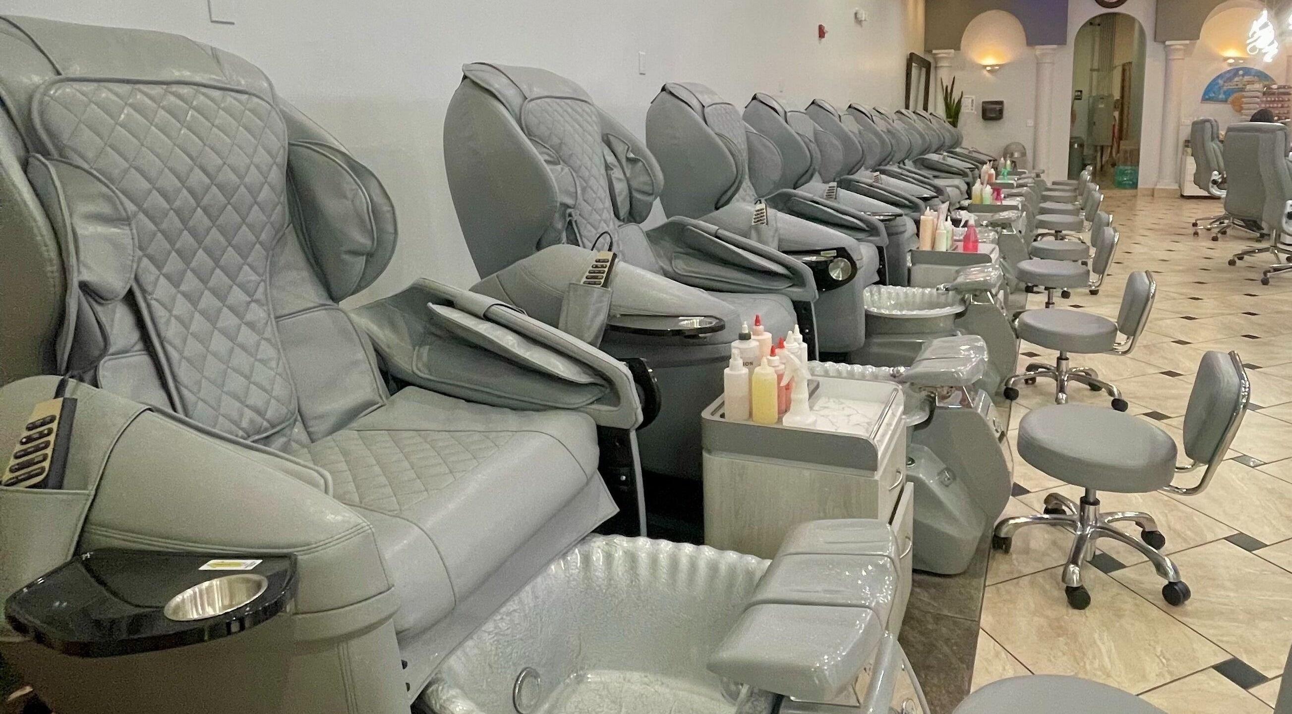 Elegant pedicure chairs at Aladdin Nails & Spa in Ocoee, Florida, US offering a luxurious experience.