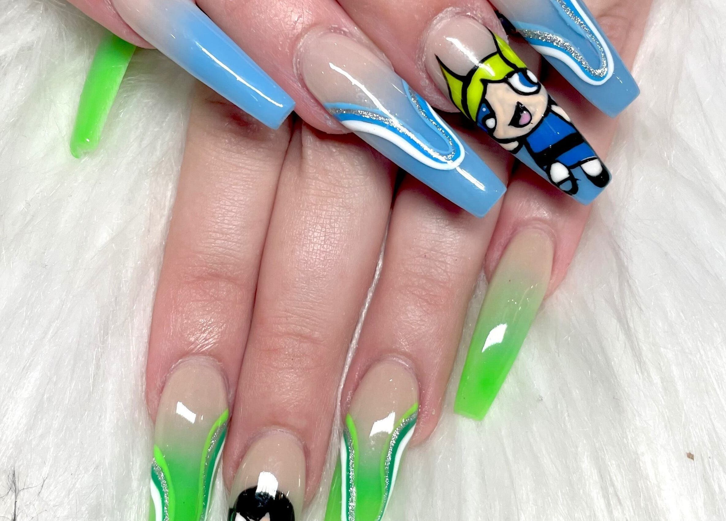 Colorful nail art at Aladdin Nails & Spa, Ocoee, Florida, US featuring vibrant designs and cartoon details.