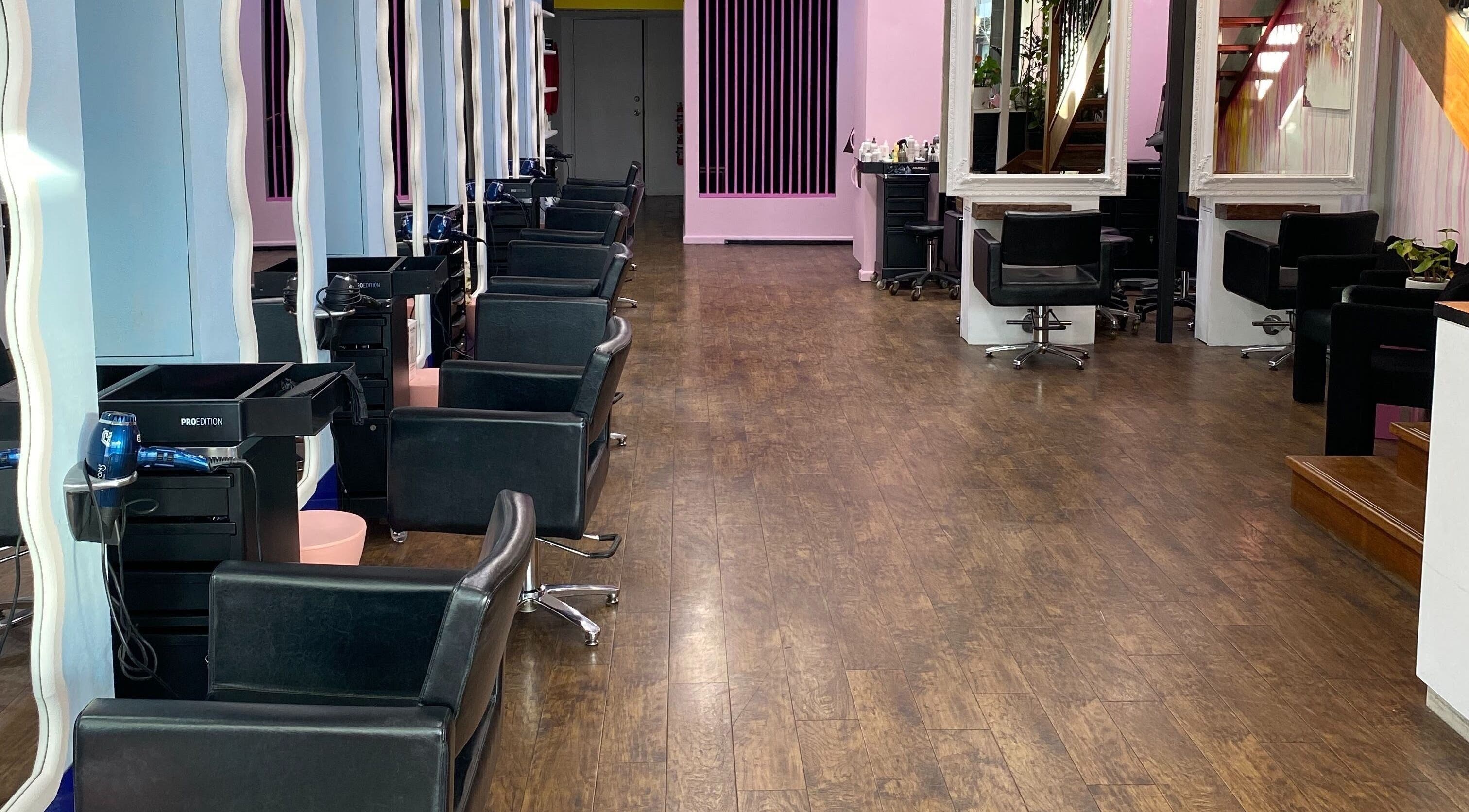 Elegant salon chairs at Charlie Joy Salon, Caringbah, New South Wales, AU with stylish decor.