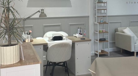 Graceful Beauty's minimalist nail station at Clyst Saint Mary, England, GB. Elegant and inviting workspace.