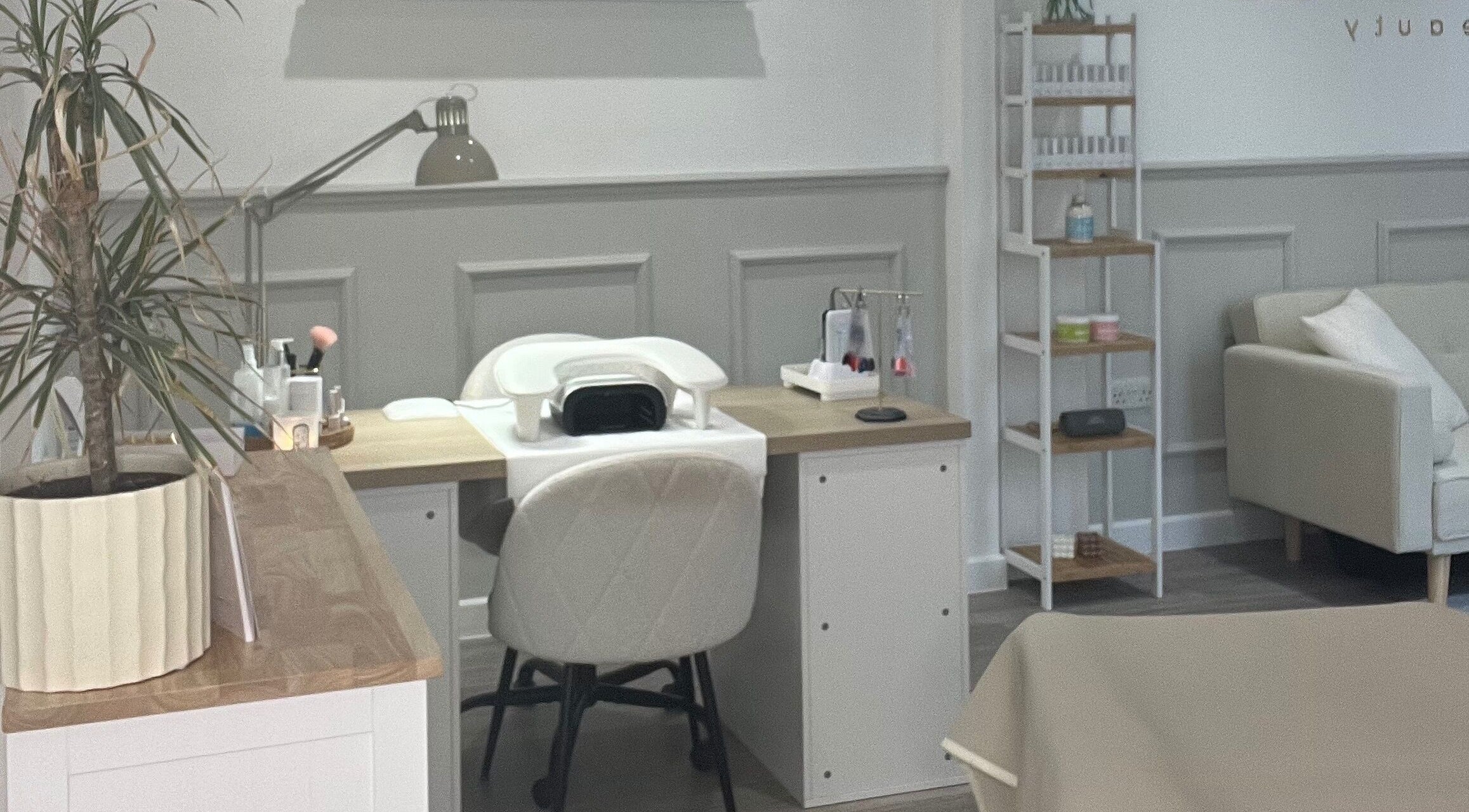 Graceful Beauty's minimalist nail station at Clyst Saint Mary, England, GB. Elegant and inviting workspace.