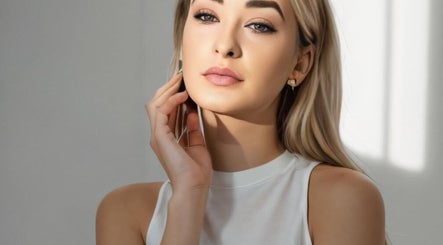 Woman with radiant skin at Your Nail World, Haarlem, NL, showcasing elegance and wellness.