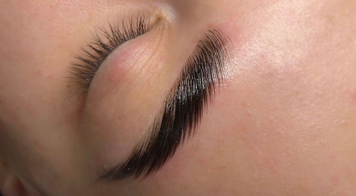 Close-up of expertly applied eyelash extensions at Mili Brows & Lashes, Boston, England, GB.