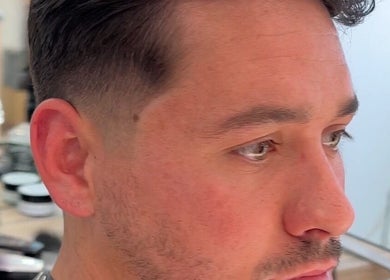 Close-up of a fresh haircut at Cult Barbers in Coventry, England, GB, showcasing precise barber skills.