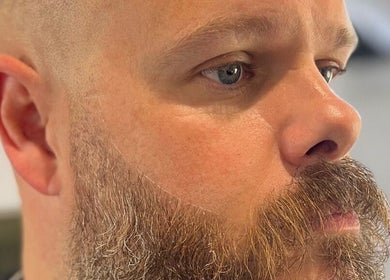 Close-up of a neatly styled beard at Cult Barbers, Coventry, England, GB showcasing grooming expertise.
