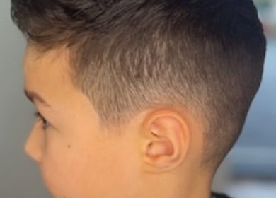 Close-up of a haircut with fade at Cult barbers, Coventry, England, GB.