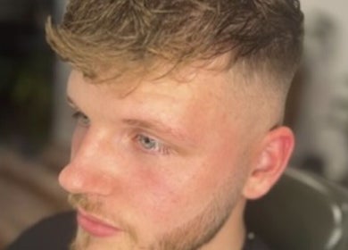 Close-up of stylish fade haircut at Cult Barbers, Coventry, England, GB, showcasing expert grooming.