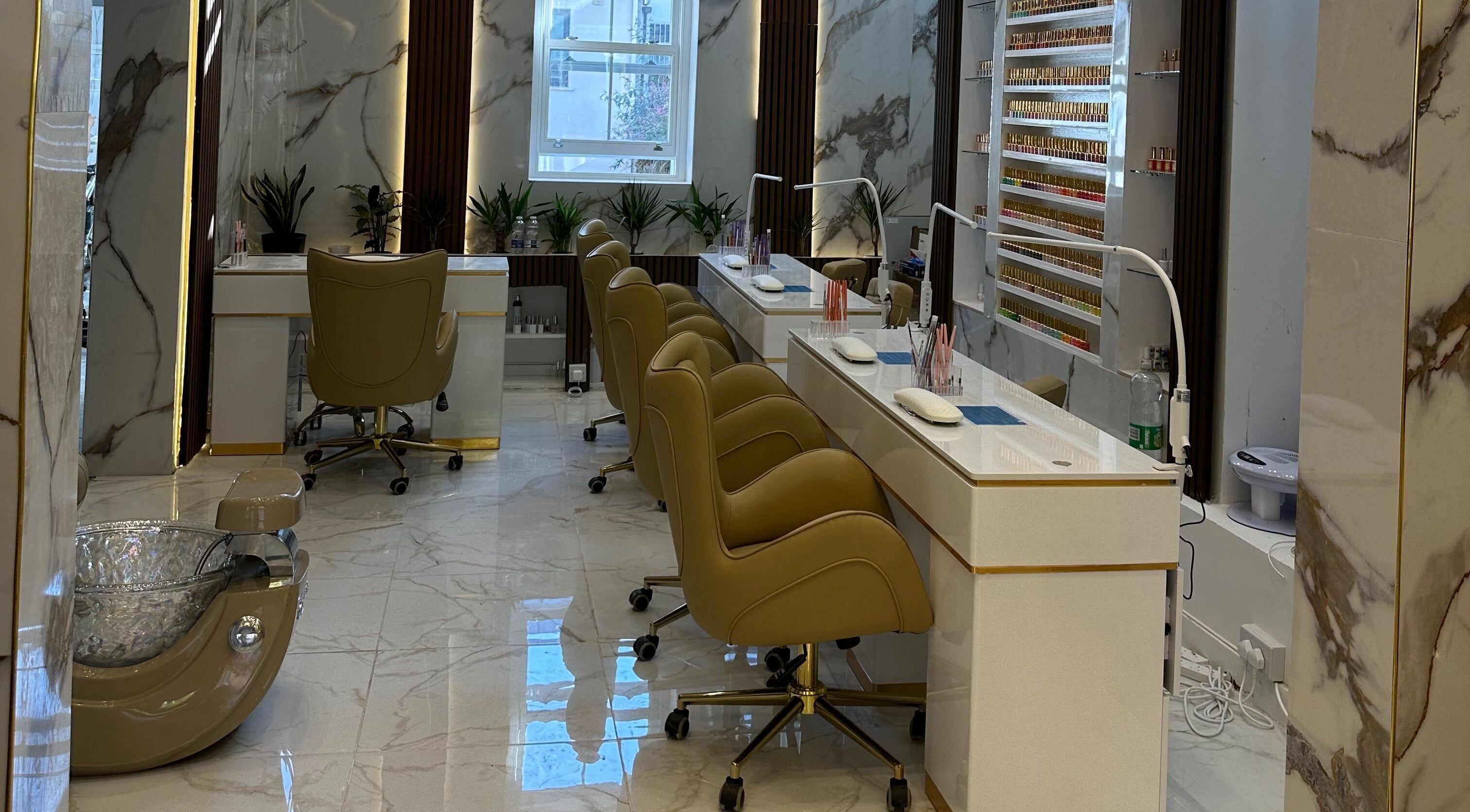 Lux Nails Spa & Lash in Dublin, County Dublin, IE offers a chic, serene nail salon with plush chairs and marble decor.