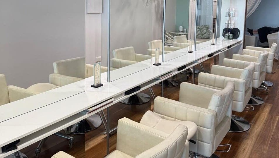 Elegant salon chairs at Heads In The Cloud, Buderim, Queensland, AU, offering a tranquil beauty experience.