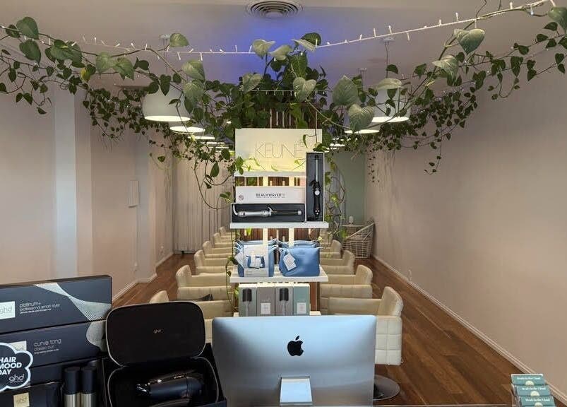 Modern salon interior at Heads In The Cloud, Buderim, Queensland, AU, featuring elegant decor and beauty products.