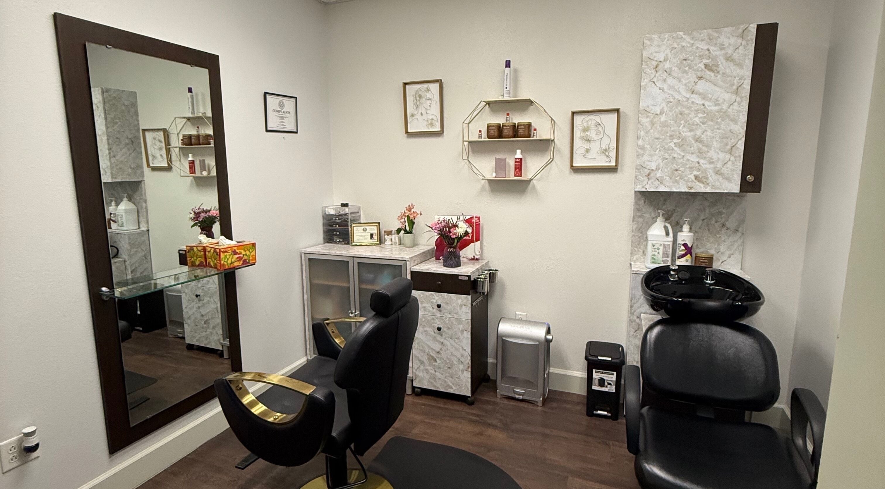 Elegant interior of Shabana Hair Salon in Missouri City, Texas featuring styling chair and modern decor.
