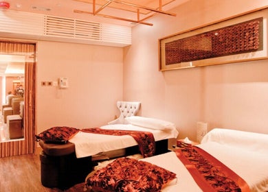 Relaxing massage room at First Class Foot Massage Company Limited, Kowloon, HK offers tranquility and comfort.