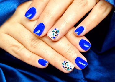 Stylish blue and white nail art at Poise & Polish Beauty Bar, Cape Town, Western Cape, ZA.