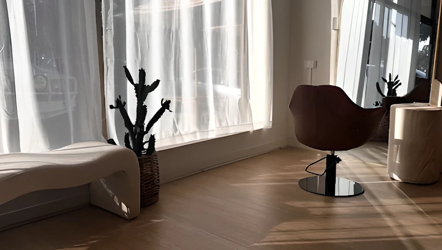 Sunlit interior at Hair By Eden Carruthers, Melbourne, Victoria, AU, featuring elegant decor and seating.