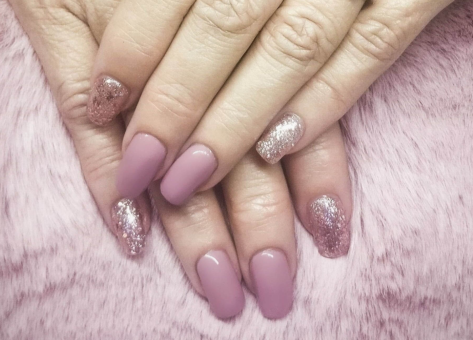 Elegant pink and glittery nails at Nails By Kim in Pretoria, Gauteng, ZA, perfect for stylish fashion enthusiasts.