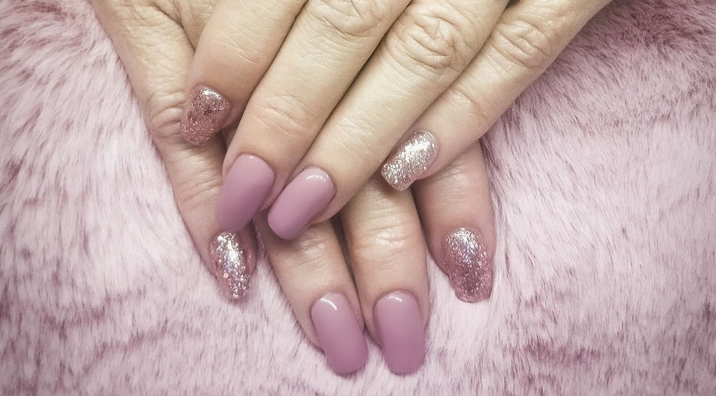 Elegant pink and glittery nails at Nails By Kim in Pretoria, Gauteng, ZA, perfect for stylish fashion enthusiasts.
