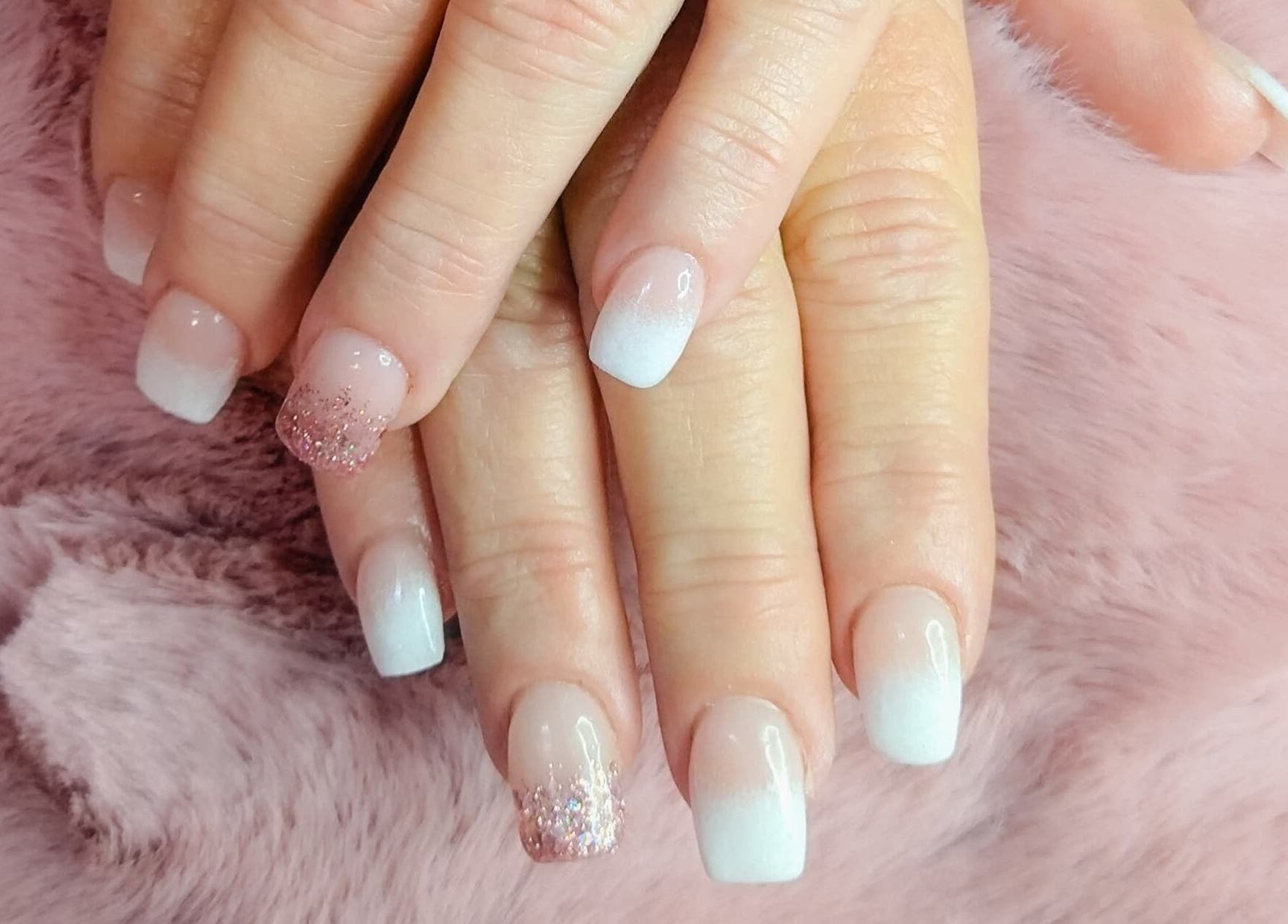 Elegant gradient nails with glitter accents at Nails By Kim, Pretoria, Gauteng, ZA.