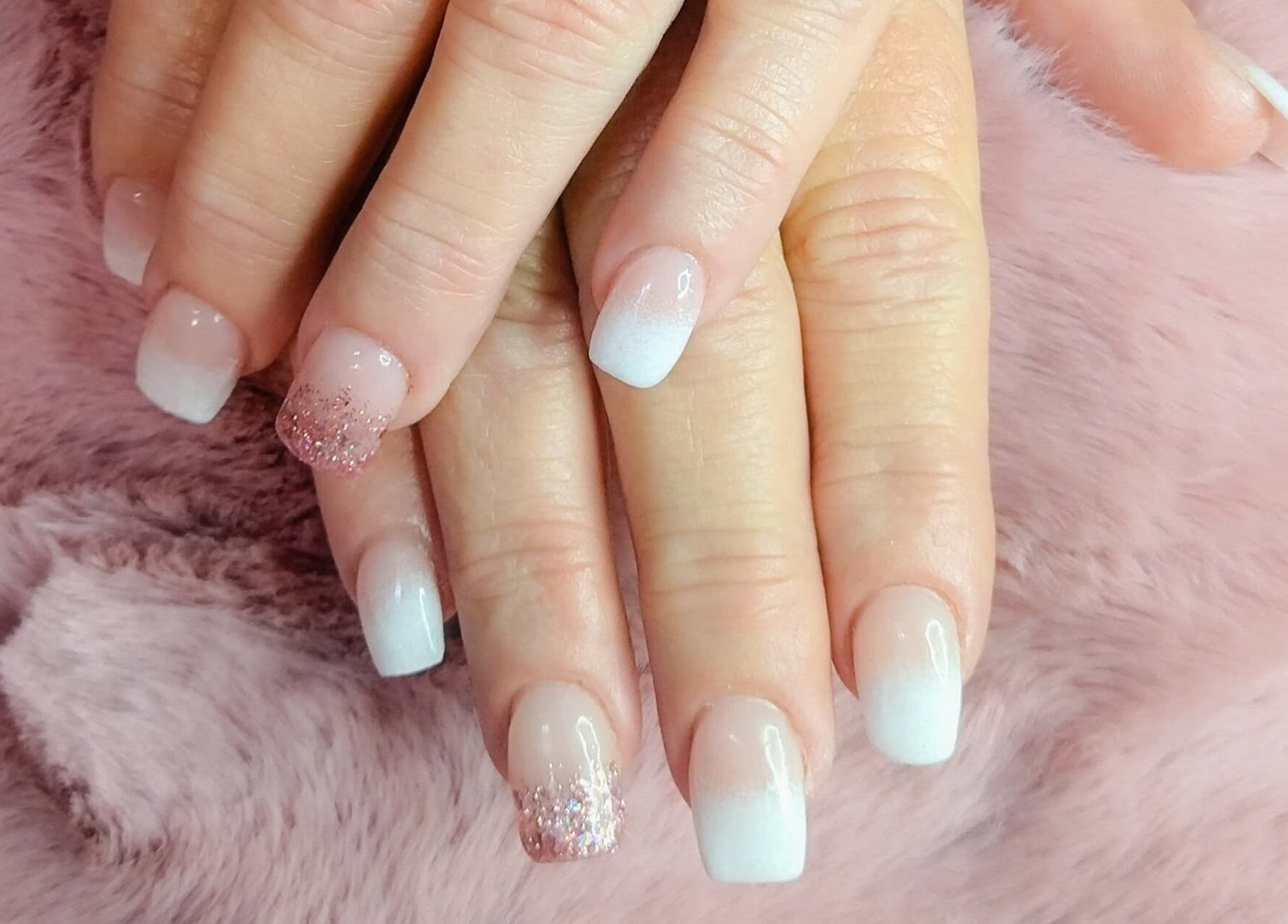 Elegant gradient nails with glitter accents at Nails By Kim, Pretoria, Gauteng, ZA.