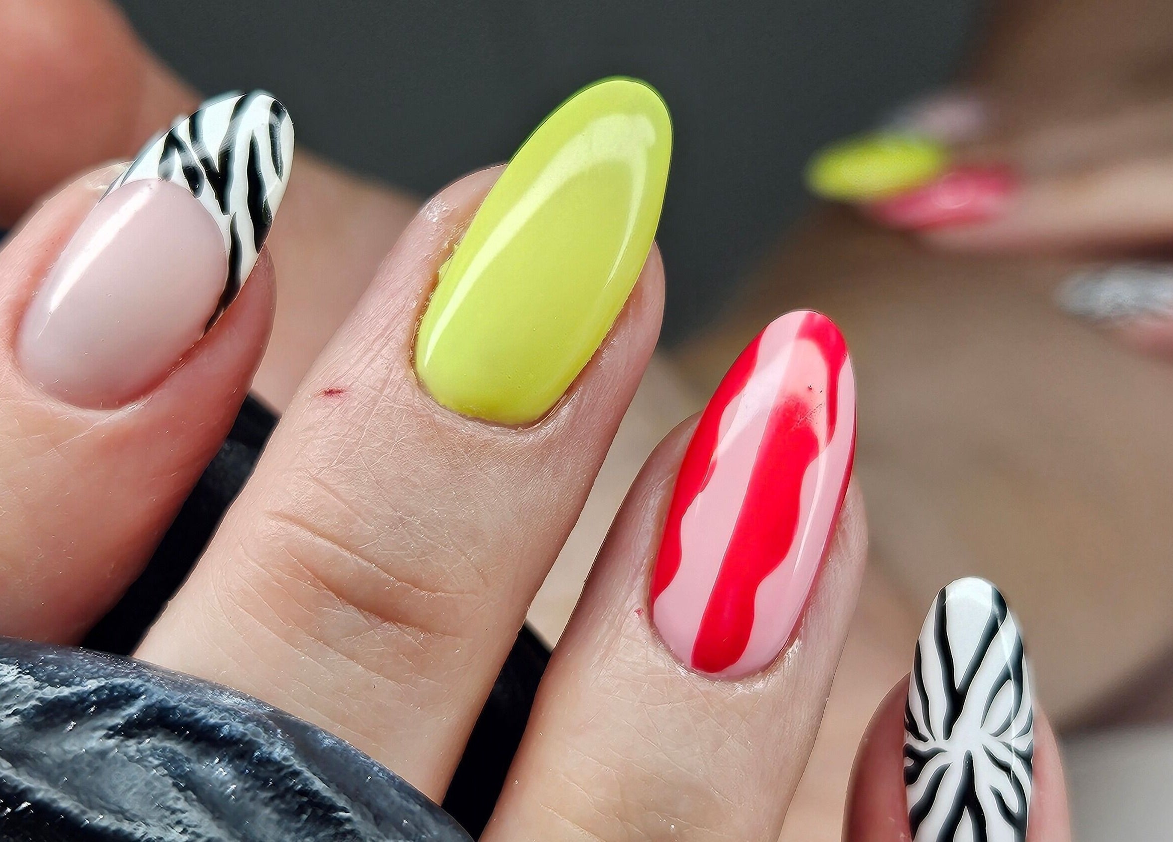 Vibrant nail art showcasing colorful designs at cwbeautyofficial, Milnrow, England, GB.