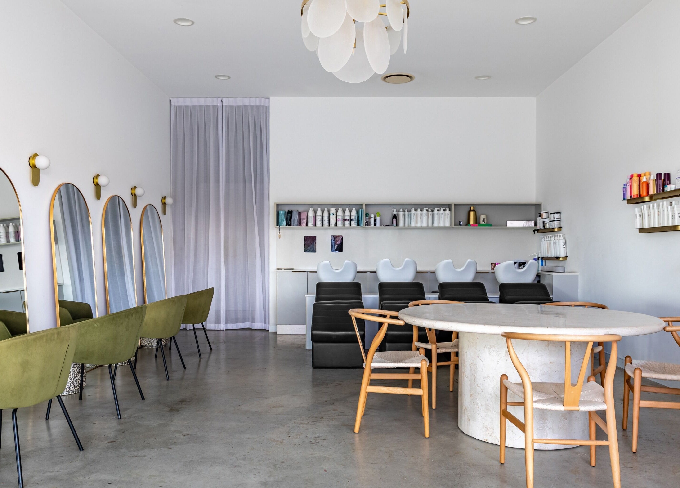 Modern salon interior at Cali Studio, Campbell, Australian Capital Territory, AU with chic decor and styling stations.